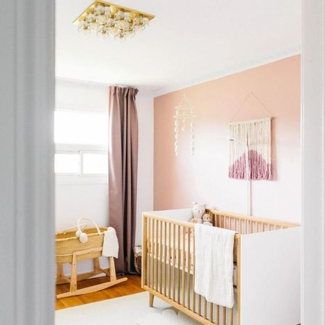 Image of a nursery with the ceiling lamp not directly above the crib