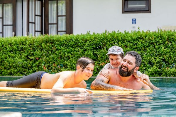 Family enjoying their outdoor pool