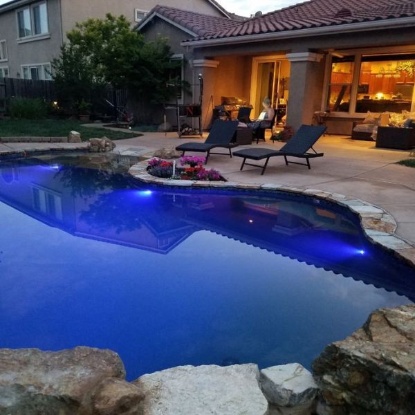 A swimming pool with dark blue water