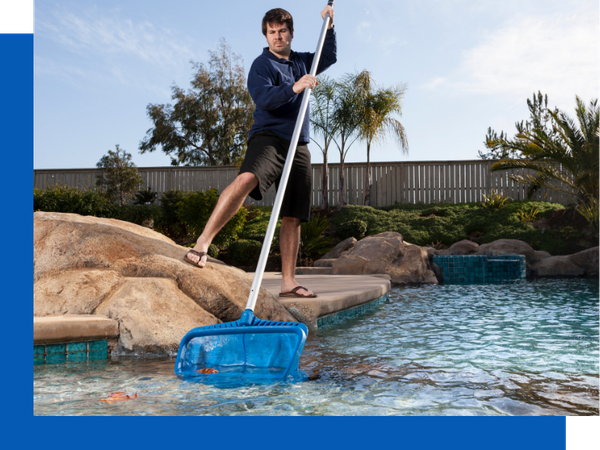 Person cleaning a pool