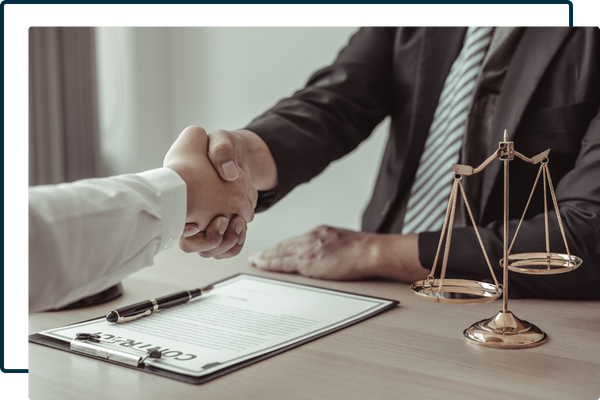 attorney and client shaking hands