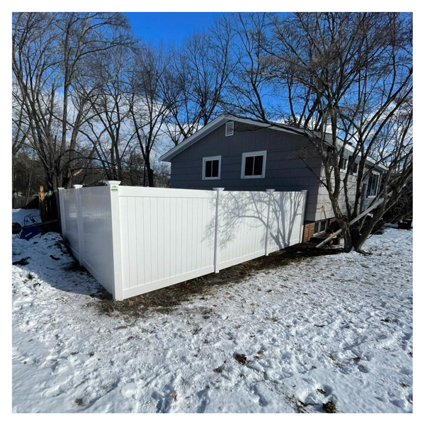 white aluminum fence in the snow