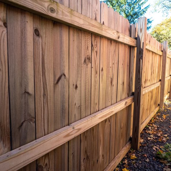 a warm red wood fence