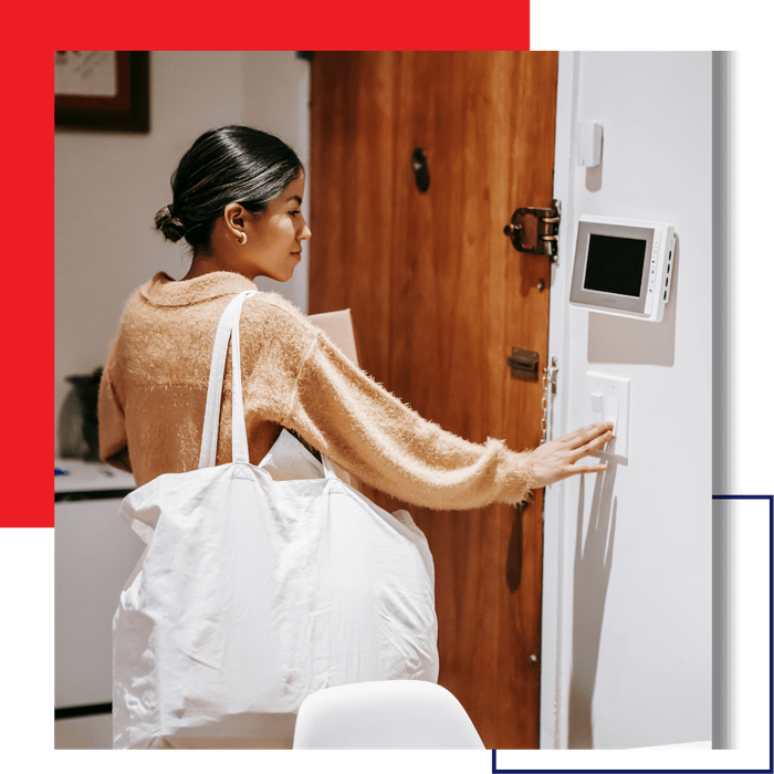 woman near thermostat woman near thermostat