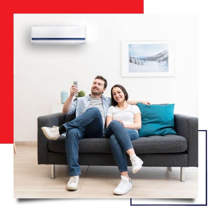 couple enjoying air conditioning in home