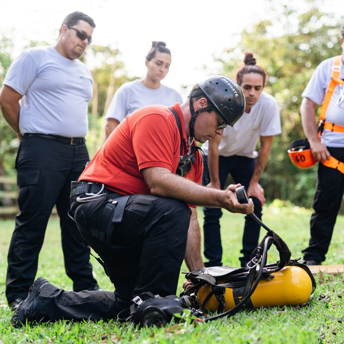 An instructor training a group of firefighters