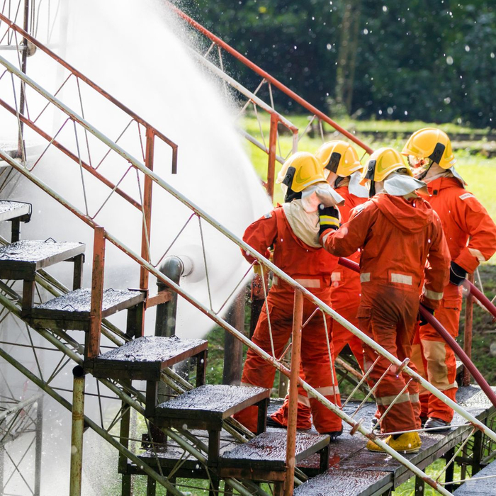 A group of firefighters in training A group of firefighters in training