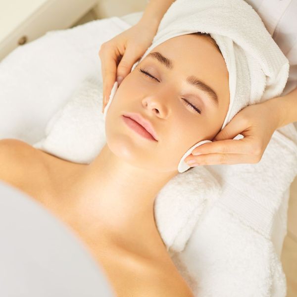 woman receiving facial treatment