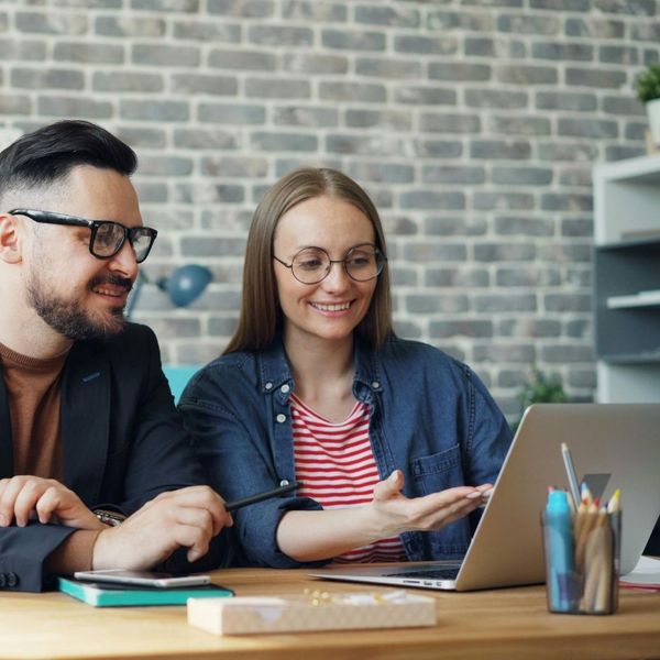 couple comparing prices of a furnace repair vs replacement