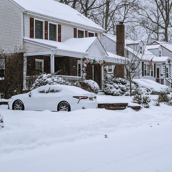 exterior of home covered in snow