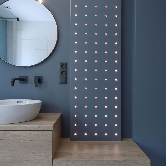 Beautiful sink with circular mirror above