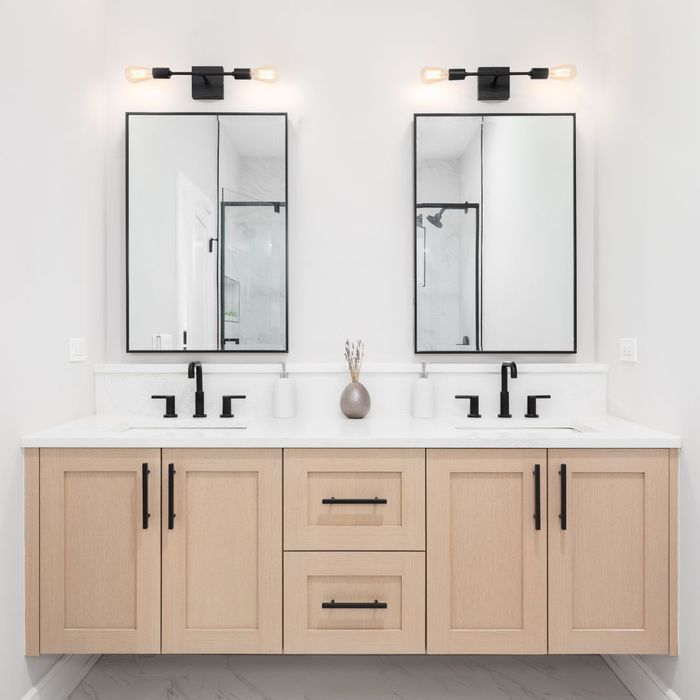 double sink floating vanity with black accent 