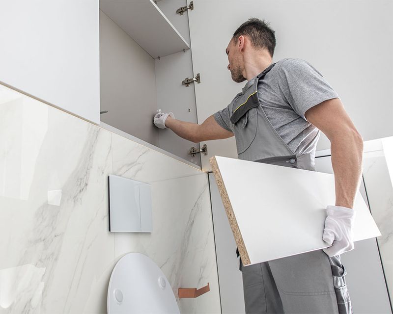 contractor working on bathroom contractor working on bathroom