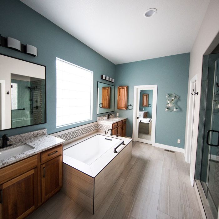 bathroom with teal painted walls