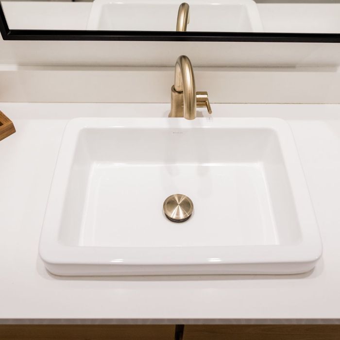 sink with gold fixtures 