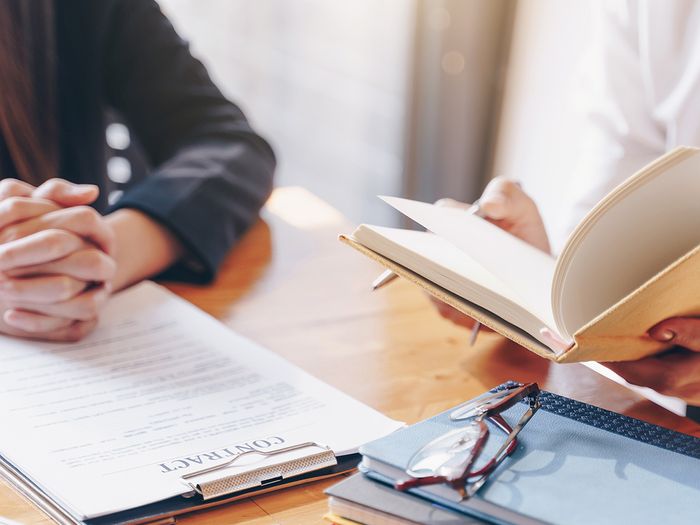 Male lawyer or judge consult having team meeting with client 