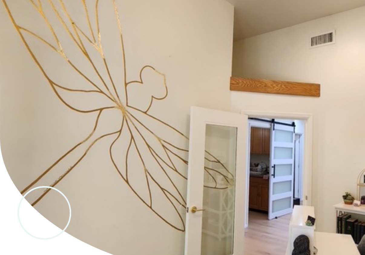 dragonfly on office wall