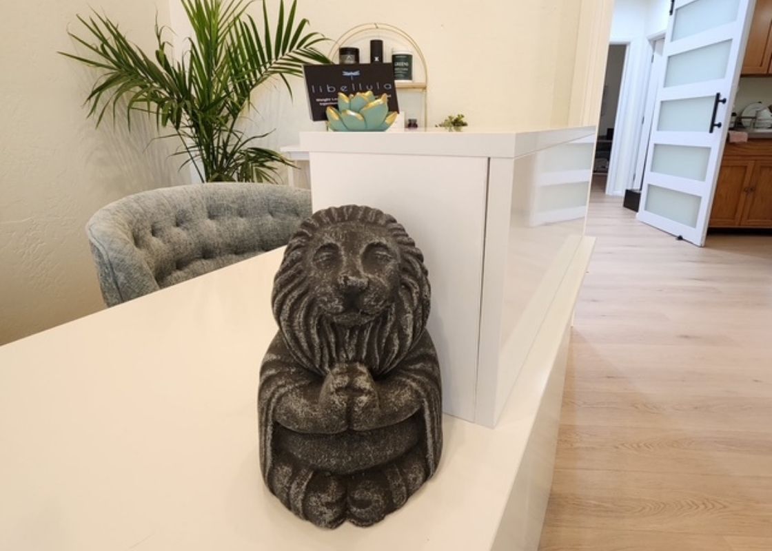 calming statue on desk