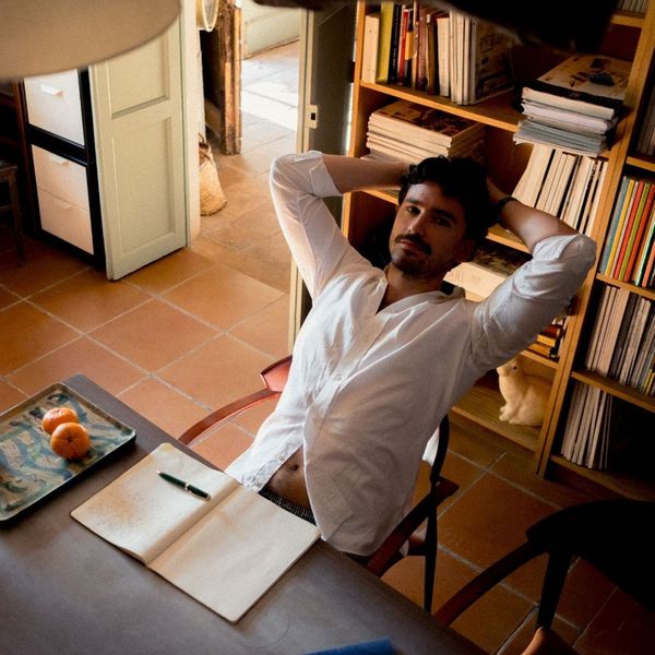 A man relaxing in his office