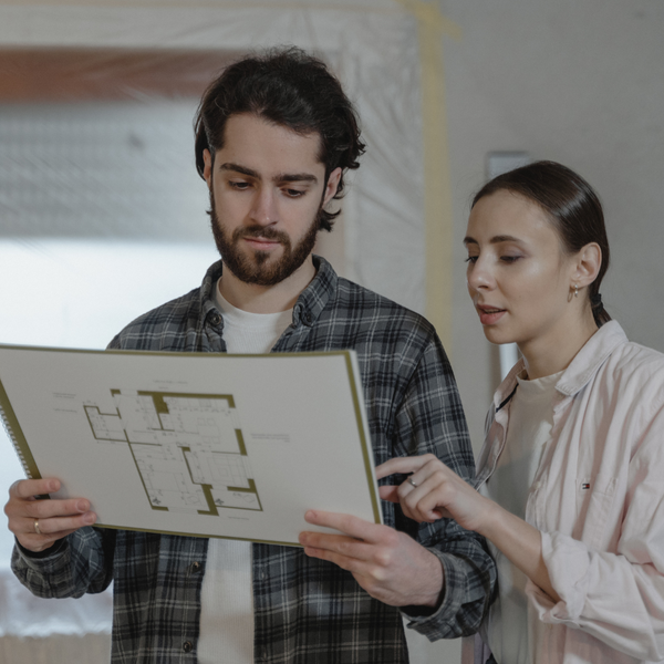 couple looking over floor plan