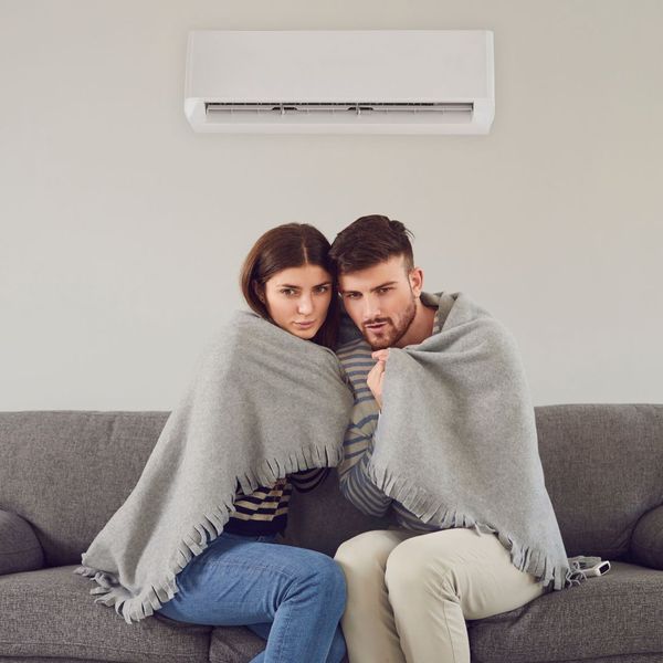 couple cold inside home