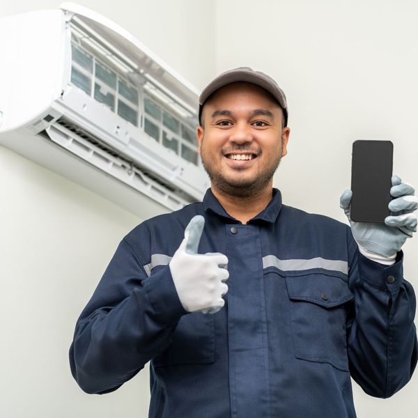 HVAC contractor giving a thumbs up