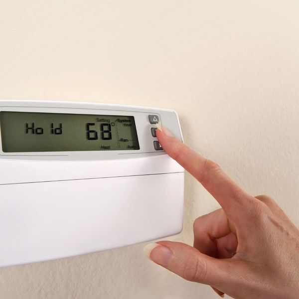adjusting a thermostat