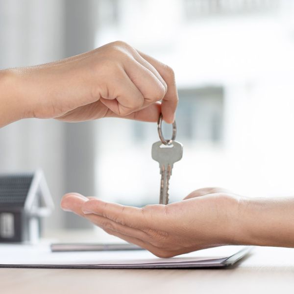 homeowner recieving a house key