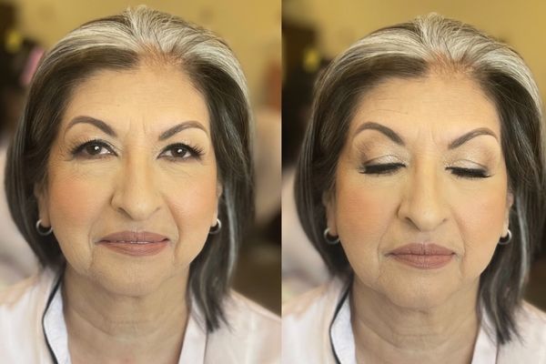 A woman smiling with her makeup professionally done A woman smiling with her makeup professionally done