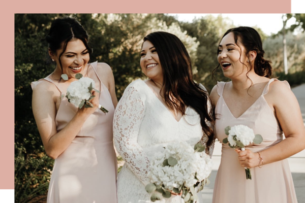 Smiling bride with bridesmaids Smiling bride with bridesmaids