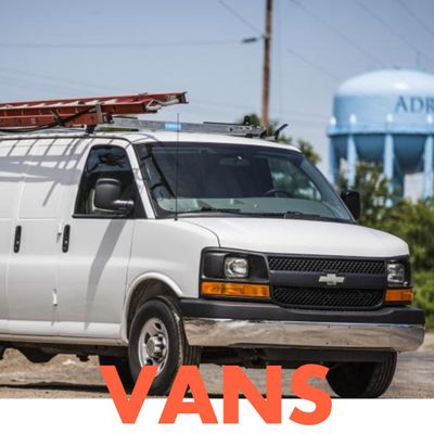 a van with a ladder on top Vans.jpg