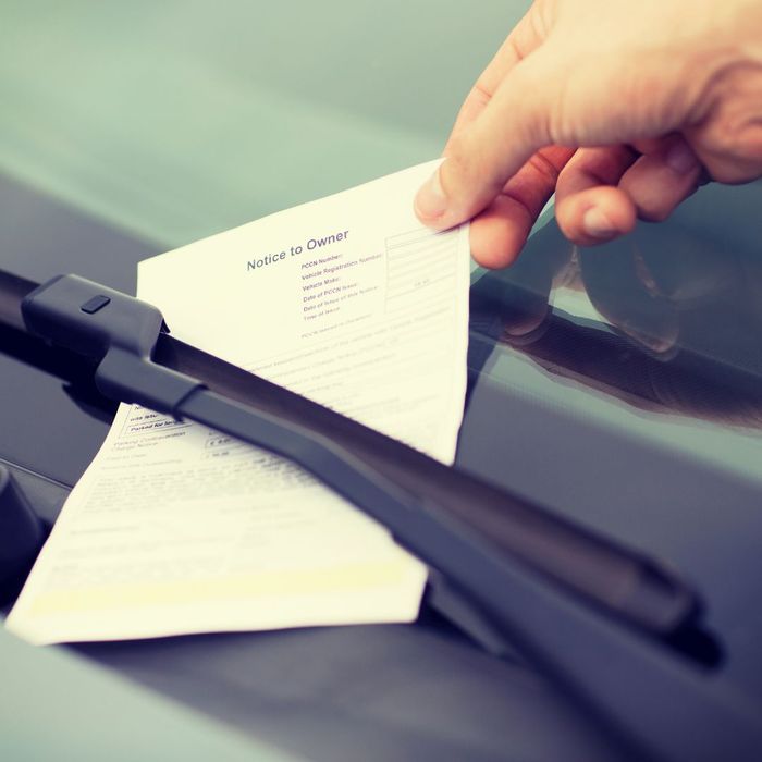 ticket on windshield of car