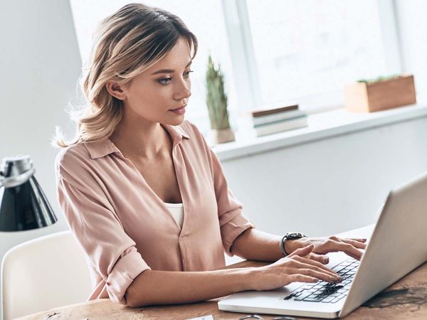 picture of woman researching surrogacy