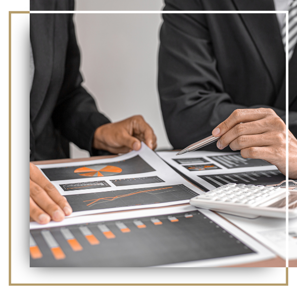 Consultants reviewing a business's revenue.