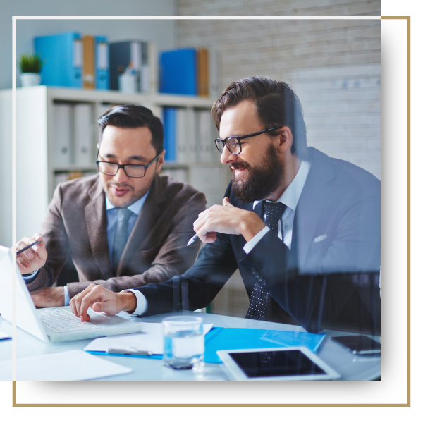 Two business partners working together in a meeting.