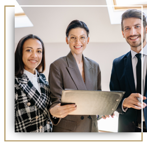 Three smiling professional buying representatives.