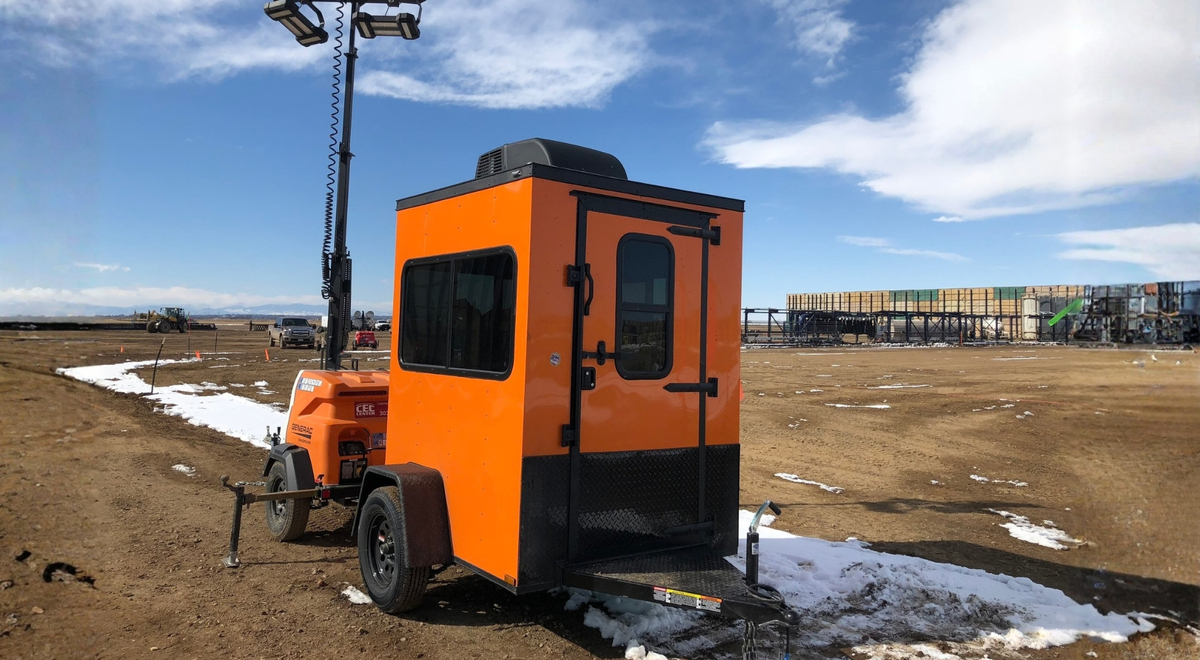 orange trailer at construction site