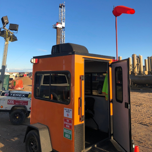 orange trailer at construction site