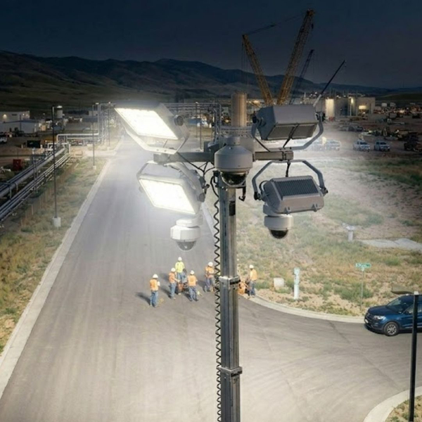 light and cameras on site with workers