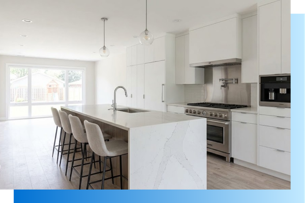 custom kitchen with white cabinets and natural light