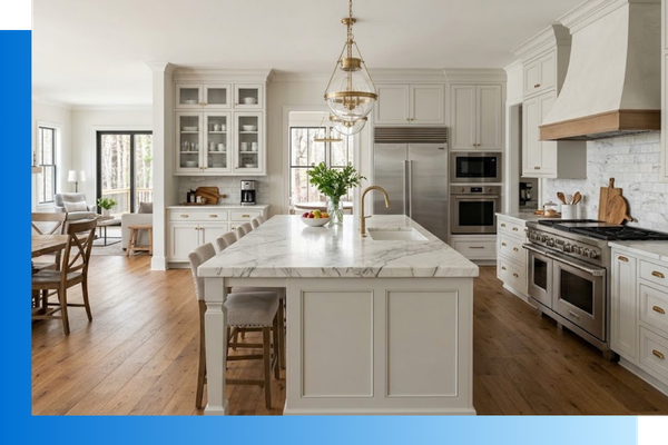 open-concept kitchen featuring an oversized white marble island, custom inset cabinetry