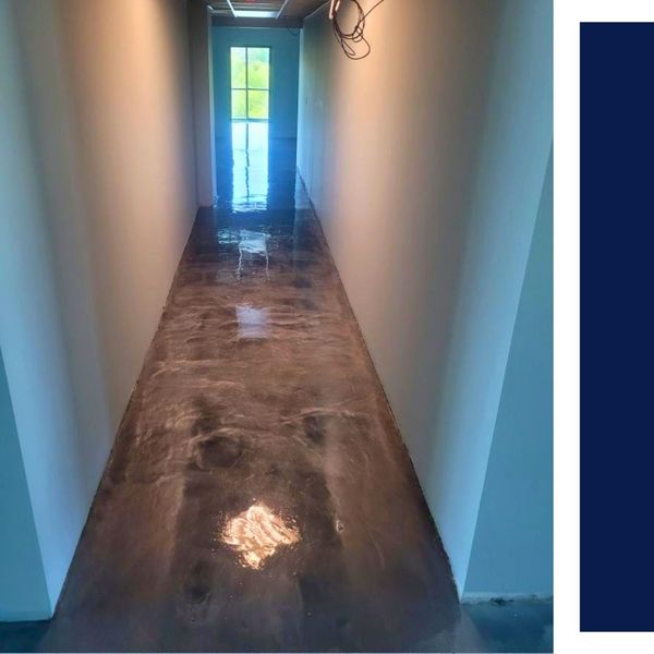 High-gloss metallic epoxy flooring in a narrow hallway