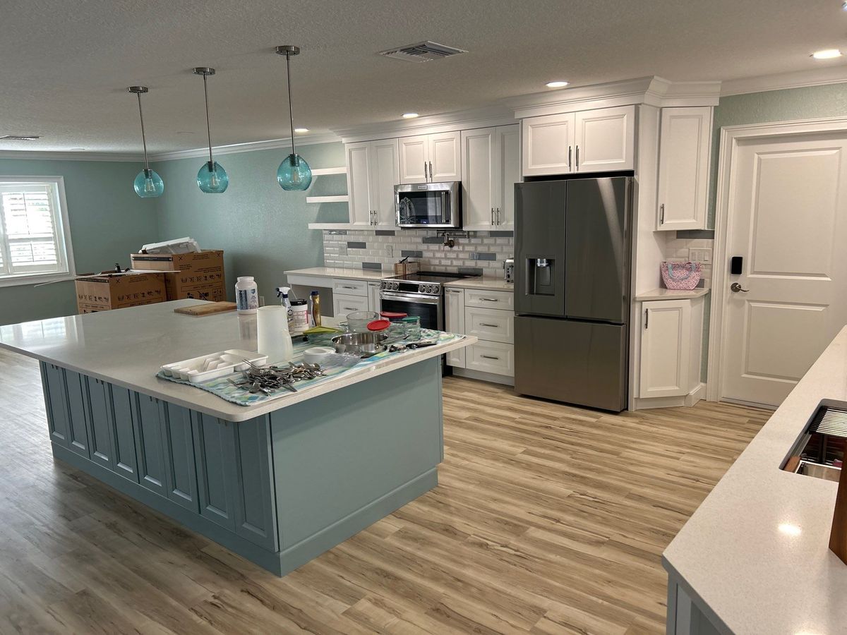 kitchen with teal kitchen island