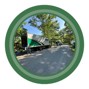 driveway with 2 moving trucks