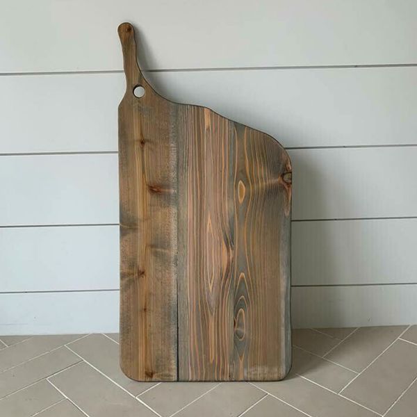A custom-made brown charcuterie board. A custom-made brown charcuterie board.