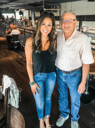 Pompo and his daughter are pictured together.