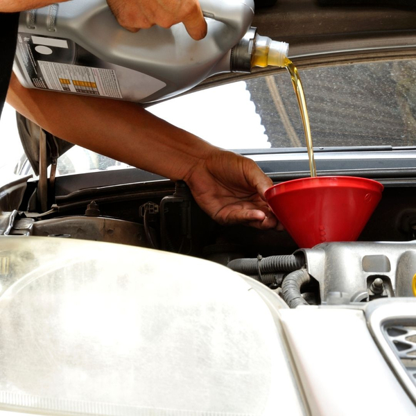 oil getting poured into car
