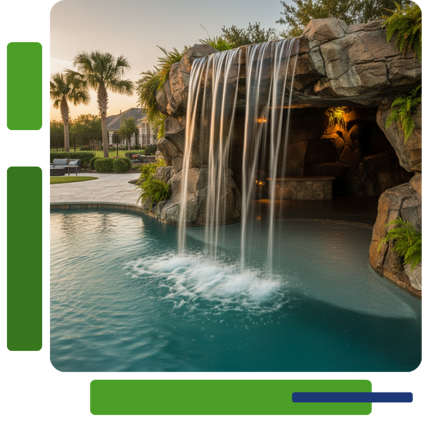 Luxurious pool with a rock grotto and waterfall, featuring a shallow entry area, lush tropical plants, and palm trees in the background at sunset.