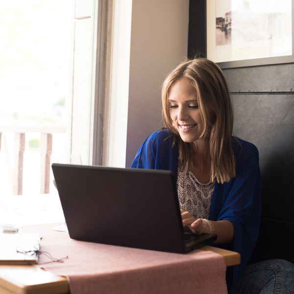 woman researching on laptop