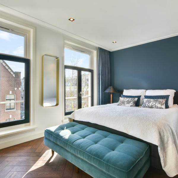 Bedroom with blue accent wall